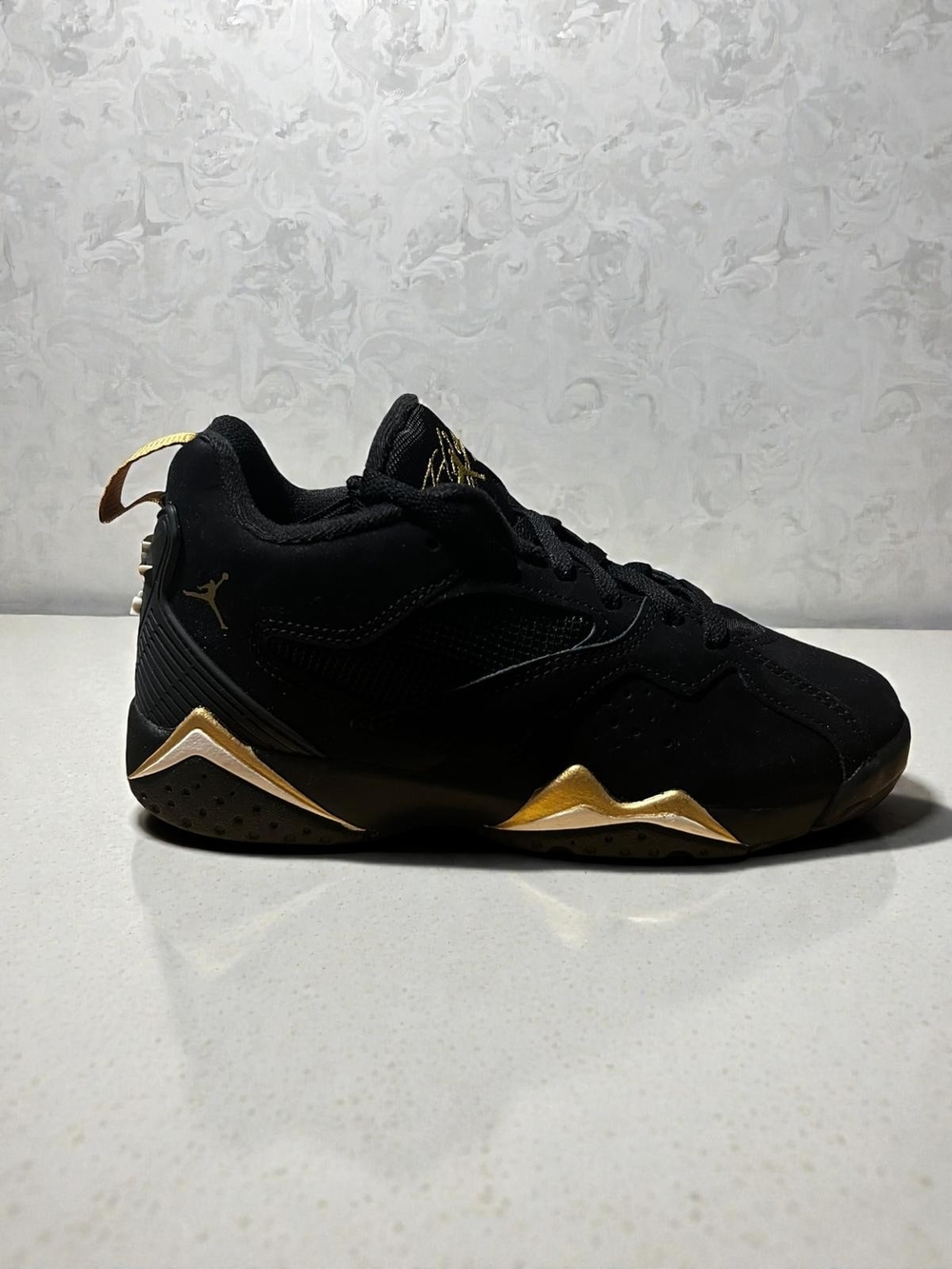 Jordan Black and Gold Low-Top Sneaker